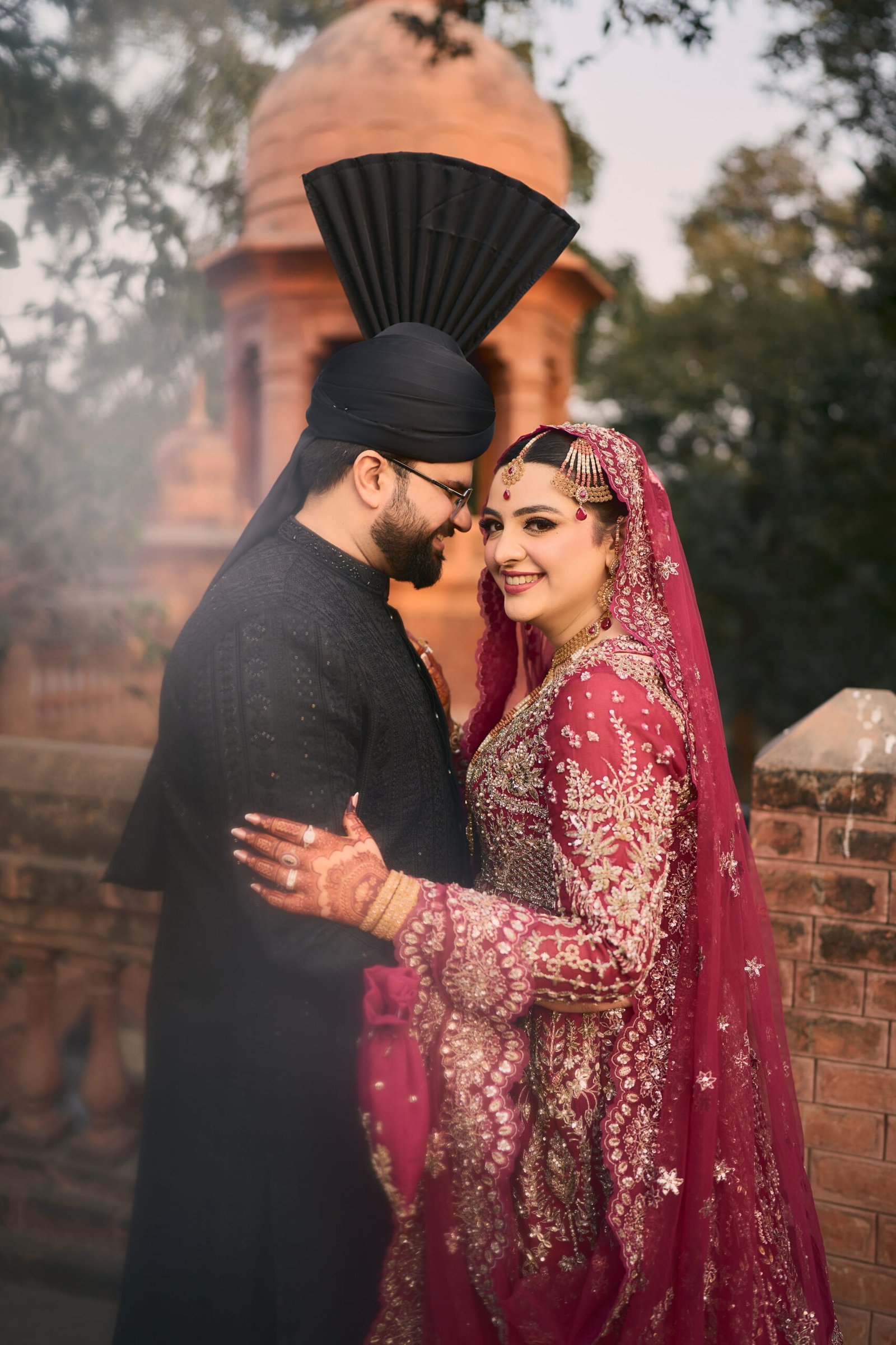 Bride and groom in a traditional outdoor wedding portrait